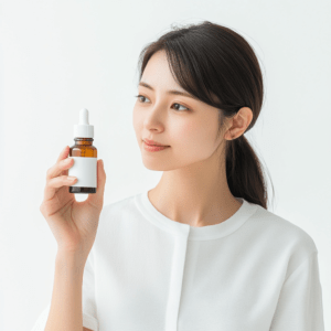 Japanese_woman_in_her_30s_holding_a_topical_medicine_in a bottle