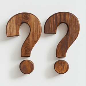 2_question_marks_made_from_wood_white_background